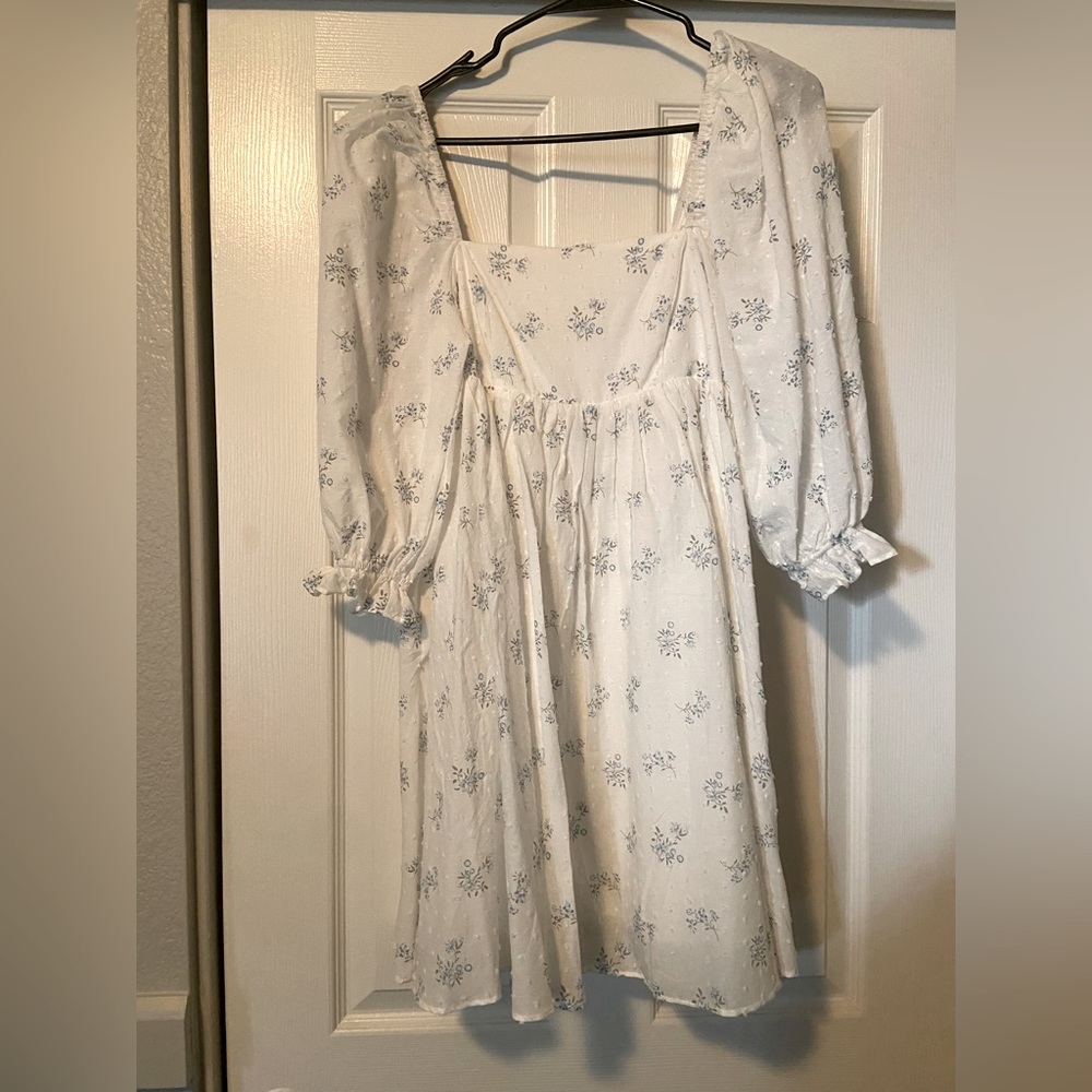 Babydoll mini dress with puff sleeves. Size small, new with tags.
